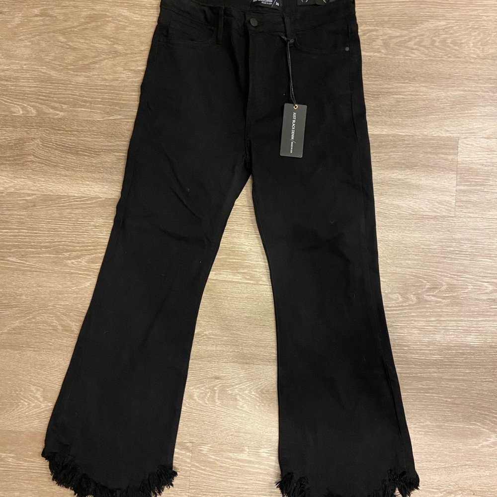 Black curved hem crop flare jeans